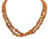 <span class='ref_item'>214 -</span> <span class="object_title">COLLAR LARGO DE IMITACIÓN DE ÁMBAR</span>  <p><span class="technical_description">Collar de dos vuelta formado por piezas enfiladas de imitación de ámbar.<br/>Longitud: 125cm</span><br>Peso: <span class="PESO_HCES1">42,60</span> <span class="PESOUMED_HCES1">gr.</span><br></p>