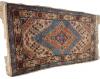 <span class='ref_item'>25 -</span> <span class="object_title">ALFOMBRA DE LANA PERSA, S.XX</span>   <p><span class="object_title">ALFOMBRA DE LANA PERSA, S.XX</span><br><span class="technical_description">Campo color azul y beige con decoración de rombos superpuestos con motivos geométricos y naturalistas.<br/>Presenta deterioros por su uso.<br/> </span><br><span class="ALTO_HCES1">140</span>x<span class="ANCHO_HCES1">68 </span><span class="ANCHOUMED_HCES1">cm.</span></p>