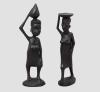<span class='ref_item'>159 -</span> <span class="object_title">DOS FIGURAS FEMENINAS </span>   <p><span class="technical_description">Realizadas en madera de ébano tallado, Ca. 1900. Falta en el plato de una de las figuras.</span><br><span class="ALTO_HCES1">20 </span><span class="ALTOUMED_HCES1">cm.</span></p>