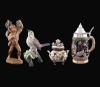<span class='ref_item'>211 -</span> <span class="object_title">LOTE DE CUATRO PIEZAS DECORATIVAS DE DIFERENTES MATERIALES, S.XX</span>   <p><span class="technical_description">Comprende:<br/>Azucarero de loza italiana policromada de 16 cm de altura. Decorada con motivos florales.<br/>Pájaro en una rama de porcelana policromada firmada C. Martin de 19 cm de altura.<br/>Niño comiendo uvas de madera policromada italiana de 26 cm de altura. Con pegatina del fabricante en la base.<br/>Tankard alemán de loza esmaltada y tapa de metal plateado de 24 cm de altura. Marca en la base.</span><br><span class="ALTO_HCES1">20 </span><span class="ALTOUMED_HCES1">cm.</span></p>