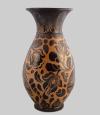 <span class='ref_item'>178 -</span> <span class="object_title">JARRÓN EN CERÁMICA ESMALTADA Y VIDRIADA EN TONO MARRÓN </span>   <p><span class="technical_description">Con decoración incisa con motivos florales y pavos reales.<br/>Inscripción en la base "Kissi Mihaly Roromd".</span><br><span class="ALTO_HCES1">43 </span><span class="ALTOUMED_HCES1">cm.</span></p>