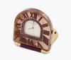 <span class='ref_item'>144 -</span> <span class="object_title">RELOJ DESPERTADOR PLEGABLE CARTIER EN METAL DORADO. CUARZO</span>  <p><span class="technical_description">Realizado en metal dorado, con detalles en esmalte color burdeos. Movimiento de cuarzo. Esfera blanca firmada CARTIER PARIS, con numeración romana en el bisel. Funciones horarias, minuteras y alarma. Número de serie: 357206079. Acompañado por bolsa de ante original. No funciona, necesita reparación.<br/>Medidas: 5 x 5,5cm</span><br>Peso: <span class="PESO_HCES1">142,30</span> <span class="PESOUMED_HCES1">gr.</span><br></p>