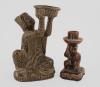 <span class='ref_item'>107 -</span> <span class="object_title">CONJUNTO DE CANDELERO Y FIGURA SIGUIENDO MODELOS DE LA DINASTÍA SONG. CHINA</span>   <p><span class="technique_material">Cerámica</span><br><span class="technical_description">Candelero de 16,5 cm de altura, vástago representando la figura de un mono sosteniendo en su cabeza el platillo y la luz. Con restos de cera.<br/>Figura sedente en cerámica esmaltada y vidriada en tono verde sosteniendo en sus manos un platillo de 24,5 cm.</span><br></p>