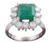 <span class='ref_item'>144 -</span> <span class="object_title">SORTIJA EN ORO 18KT, ESMERALDA Y DIAMANTES </span>  <p><span class="technical_description">Sortija realizada en oro de 18kt, con contrastes. Formada por una esmeralda central en su talla, engastada en garras, con un peso aproximado de 6.40ct, orlada por diamantes en talla brillante engastados en garras, con un peso total aprox de 1.20ct.<br/>Medida Sortija: 15</span><br>Peso: <span class="PESO_HCES1">6,80</span> <span class="PESOUMED_HCES1">gr.</span><br></p>