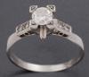 <span class='ref_item'>8 -</span>  <span class="object_title">SOLITARIO ANTIGUO EN ORO 18 KT CON DIAMANTE CENTRAL EN CUATRO GARRAS</span><br><span class="technical_description"> solitario tipo antiguo en oro de 18 kt con diamante central en garras aprox 0.30ct</span>  
