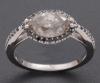 <span class='ref_item'>25 -</span>  <span class="object_title">SORTIJA EN ORO DE 18 KT CON DIAMANTE CENTRAL TALLA MARQUISE </span><br><span class="technical_description">sortija en oro de 18kt con diamante talla marquise aprox de 2.10 ct y diamantes talla brillante aprox 0.10 ct </span>  