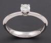<span class='ref_item'>30 -</span>  <span class="object_title">SOLITARIO EN ORO DE 18 KT CON DIAMANTE EN TALLA BRILLANTE.</span><br><span class="technical_description">Peso aprox. del diamante 0,32 ct</span>  