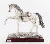 <span class='ref_item'>335 -</span> <span class="object_title">FIGURA DE CABALLO GALOPANDO </span>   <p><span class="technique_material">Metal bañado en plata de ley.</span><br><span class="technical_description">Con peana de madera </span><br><span class="ALTO_HCES1">27 </span><span class="ALTOUMED_HCES1">cm.</span>x<span class="ANCHO_HCES1">13 </span><span class="ANCHOUMED_HCES1">cm.</span>x<span class="GRUESO_HCES1">27 </span><span class="GRUESOUMED_HCES1">cm.</span></p>