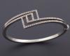 <span class='ref_item'>149 -</span> <span class="object_title">PULSERA RIGIDA EN ORO DE 18KT T DIAMANTES </span>  <p><span class="technical_description">pulsera rigida con forma geometrica acompañada de diamantes talla brillante de aprox 0.60 ct </span><br>Peso: <span class="PESO_HCES1">29,10</span> <span class="PESOUMED_HCES1">gr.</span><br></p>