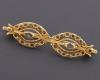 <span class='ref_item'>108 -</span> <span class="object_title">BROCHE ANTIGUO REALIZADO EN ORO DE 18 KT Y DIAMANTES </span>  <p><span class="technical_description">broche antiguo realizado en oro de 18 kt con diseño de doble ovalo con diamantes talla rosa intercalados 0.20 ct con cierre de aguja </span><br>Peso: <span class="PESO_HCES1">4,70</span> <span class="PESOUMED_HCES1">gr.</span><br></p>