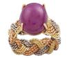 <span class='ref_item'>128 -</span> <span class="object_title">SORTIJA CON RUBÍ CENTRAL EN ORO BICOLOR DE 18 KT</span>  <p><span class="technical_description">Sortija con rubí en talla cabujón en oro bicolor de 18 kt.<br/>Medida Sortija: 14</span><br>Peso: <span class="PESO_HCES1">7,40</span> <span class="PESOUMED_HCES1">gr.</span><br></p>