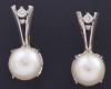 <span class='ref_item'>2 -</span>  <span class="object_title">PENDIENTES REALIZADOS EN ORO DE 14 KT. CON PERLA Y DIAMANTES</span><br><span class="technical_description">Pendientes en oro de 14 kt. con perlas cultivadas y diamantes en talla brillante con peso total aprox. 0,05 ct con cierre catalán. </span>  