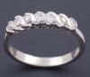 <span class='ref_item'>30 -</span>  <span class="description">SORTIJA SEPTILLO DE ORO DE 18 KT Y DIAMANTES Sortija septillo de oro de 18 kt. con diamantes talla brillante con engaste tipo chatón.Peso total aprox. en diamantes: 0,21 ct. </span>  