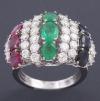 <span class='ref_item'>22 -</span>  <span class="object_title">SORTIJA EN ORO DE 18 KT. CON DIAMANTES, RUBÍES, ZAFIROS Y ESMERALDAS </span><br><span class="technical_description">Sortija en oro de 18 kt. engastada en garras con llamativo centro combinando esmeraldas, rubíes y zafiros en talla oval alternado con diamantes en talla brillante con un peso total aprox. de 1.90 ct.<br/>Peso aprox de esmeraldas 1.25ct.<br/>Peso aprox de zafiros1.30ct.<br/>Peso aprox de rubies1.30ct.<br/>Ref: 73217</span>  