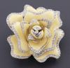 <span class='ref_item'>33 -</span>  <span class="object_title">BROCHE CON FORMA DE DELICADA ROSA AMARILLA DE ESMALTE Y DIAMANTES EN ORO DE 18 KT.</span><br><span class="technical_description">Broche en oro de 18 kt. representando una rosa con pétalos de esmalte amarillo pálido ribeteados de diamantes en talla brillante.<br/>Peso total aprox. en diamante: 1,15 ct.<br/>Ref: 71632 </span>  