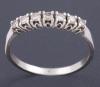 <span class='ref_item'>164 -</span>  <span class="object_title">SORTIJA EN ORO DE 18 KT CON DIAMANTES </span><br><span class="technical_description"> Sortija septillo realizada en oro de 18 kt. con diamantes en talla brillante engastados en garras, con un peso total aprox de 0.35 ct. </span>  