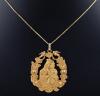 <span class='ref_item'>40 -</span>  <span class="object_title">COLGANTE DE ORO AMARILLO DE 18 KT. CON CADENA DE PLATA CHAPADA EN ORO DE 18 KT</span><br><span class="technical_description">Colgante de oro de 18 kt. con representacion de Virgen con niño en brazos. Con cadena de plata chapada en oro<br/> </span>  