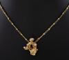 <span class='ref_item'>6 -</span>  <span class="object_title">CADENA Y COLGANTE EN ORO DE 18KT. </span><br><span class="technical_description">Cadena intercalada con barritas y eslabones, colgante inspirado en Dalí realizado en oro de 18 kt. </span>  