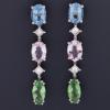 <span class='ref_item'>26 -</span>  <span class="object_title">PENDIENTES LARGOS EN ORO DE 18KT. CON DIAMANTE, AGUAMARINA, TANZANITA, MORGANITA Y TSAVORITA </span><br><span class="technical_description">Pendientes largos realizados en oro de 18kt. compuestos por diferentes piedras como: dos aguamarimas en talla oval con peso aprox 1.68ct. dos morganias en talla oval con peso aprox 1.30ct. dos tsavoritas en talla marquise con peso aprox 1.53ct. acomañados de dos diamantes en talla princesa con un peso total aprox 0.36ct. <br/>Cierre de presión. </span>  