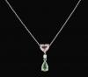 <span class='ref_item'>29 -</span>  <span class="object_title">CADENA CON COLGANTE EN ORO DE 18KT. CON DIAMANTES, MORGANITA Y TSAVORITA.</span><br><span class="technical_description">Cadena con colgante realizado en oro de 18 kt. compuesto por un diamante en talla brillante de peso total aprox 0.05 ct. uniendo a una morganita en talla corazón con un peso aprox de 0.88 ct, y una tsavorita en talla pera con un peso aprox de 1.10ct. </span>  