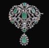 <span class='ref_item'>46 -</span>  <span class="object_title">BROCHE -COLGANTE EN ORO DE 18KT CON VISTAS EN PLATA , DIAMANTES Y ESMERALDAS</span><br><span class="technical_description">Broche- colgante antiguo realizado en oro de 18kt. con vistas en plata con diamantes en talla antigua (talla rosa sencilla), con un peso total aprox de 0.80ct. y esmeraldas en su talla de varios tamaños con un peso total aprox 2.80ct.<br/>Cierre de aguja y reasa para colgar. <br/> </span>  