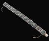 <span class='ref_item'>80 -</span>  <span class="object_title">PULSERA ANTIGUA EN ORO DE 18KT. CON VISTAS EN PLATA, DIAMANTES Y ESMERALDAS </span><br><span class="technical_description">Pulsera antigua realizada en oro de 18kt. con vistas en plata con diamantes en talla antigua (talla rosa sencilla), con un peso total aprox 1.50ct. y esmeraldas en su talla con un peso total aprox 4.50ct,(una de las esmeraldas presenta tratamiento de acetitado con color).<br/>Cierre de plata y cadena de seguridad. </span>  