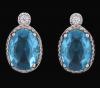 <span class='ref_item'>8 -</span> <span class="object_title">PENDIENTES DE PLATA DE LEY CON ESPINELA SINTETICA  AZUL  Y CIRCONITAS</span>  <p><span class="technical_description">Pendientes realizados en plata de ley formados por espinela sintética azul talla oval en garra y en la parte superior una circonita engastada en grano. Cierre a presión.</span><br>Peso: <span class="PESO_HCES1">1,90</span> <span class="PESOUMED_HCES1">gr.</span><br></p>