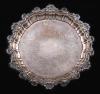 <span class='ref_item'>258 -</span> <span class="object_title">PLATO DE PLATA.</span>  <p><span class="technical_description">Plato realizado en plata con borde recortado con motivos de veneras y asiento con decoración floral grabada.<br/>20 cm diámetro. <br/>Con contrastes. </span><br>Peso: <span class="PESO_HCES1">170</span> <span class="PESOUMED_HCES1">gr.</span><br></p>