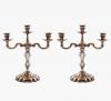 <span class='ref_item'>295 -</span> <span class="object_title">PAREJA DE CANDELABROS DE PLATA DE LEY</span>  <p><span class="technical_description">Pareja de candelabros de tres luces realizados en plata de ley de gusto clásico con fuste decorado con gallones.<br/>Con contrapeso.</span><br>Peso: <span class="PESO_HCES1">2237,50</span> <span class="PESOUMED_HCES1">gr.</span><br></p>