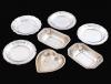 <span class='ref_item'>278 -</span> <span class="object_title">CONJUNTO DE SIETE PLATITOS DE PLATA</span>  <p><span class="technical_description">Conjunto de siete platitos de plata: cuatro con decoración lineal en el alero, dos en forma cuadrangular y uno en forma de corazón </span><br>Peso: <span class="PESO_HCES1">195,80</span> <span class="PESOUMED_HCES1">gr.</span><br></p>