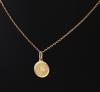 <span class='ref_item'>131 -</span> <span class="object_title">MEDALLA Y CADENA EN ORO DE 18 KT</span>  <p><span class="technical_description">Medalla y cadena realizadas en oro de 18 kt, la medalla con horoscopo sagitario.</span><br>Peso: <span class="PESO_HCES1">4,30</span> <span class="PESOUMED_HCES1">gr.</span><br></p>