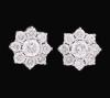 <span class='ref_item'>22 -</span> <span class="object_title">PENDIENTES ROSETON EN ORO 18 KT </span>  <p><span class="technical_description">Pendientes realizados en oro 18 kt en forma de rosetón con un brillante central con un peso total aproximado de 0.54 ct y orla con un peso total aproximado 1.15 ct. <br/>Cierre presión. </span><br>Peso: <span class="PESO_HCES1">5,20</span> <span class="PESOUMED_HCES1">gr.</span><br></p>