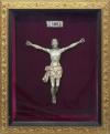 <span class='ref_item'>73 -</span> <span class="object_title">CRISTO CRUCIFICADO</span>   <p><span class="technique_material">Madera tallada</span><br><span class="technical_description">Trabajo español de mediados del S.XVII<br/>Realizado en madera tallada y parcialmente policromada. <br/>Enmarcado en caja con interior de terciopelo rojo, cristal y remate en el perímetro de madera dorada con decoración floral tallada. <br/> </span><br><span class="ALTO_HCES1">77 </span><span class="ALTOUMED_HCES1">cm.</span>x<span class="ANCHO_HCES1">61 </span><span class="ANCHOUMED_HCES1">cm.</span></p>