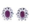 <span class='ref_item'>215 -</span> <span class="object_title">PENDIENTES EN ORO 18KT, RUBÍES Y DIAMANTES </span>  <p><span class="technical_description">Pendientes realizados en oro de 18kt. De estilo clásico, con dos rubíes centrales en talla oval engastados en bisel con un peso total aprox de 1ct, orlados por diamantes en talla brillante, engastados en tensión con un peso total aprox de 0.26ct <br/>Cierre: Omega<br/>Medidas: 1,5 x 1,1cm</span><br>Peso: <span class="PESO_HCES1">5,70</span> <span class="PESOUMED_HCES1">gr.</span><br></p>