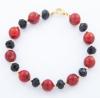 <span class='ref_item'>209 -</span> <span class="object_title">PULSERA DE CORAL Y ÓNIX</span>  <p><span class="technical_description">Pulsera compuesta por cuentas de coral alternando con cuentas facetadas de ónix. Cierre de mosquetón en metal dorado.<br/>Longitud: 19 cm</span><br>Peso: <span class="PESO_HCES1">16,60</span> <span class="PESOUMED_HCES1">gr.</span><br></p>
