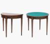 <span class='ref_item'>234 -</span> <span class="description">MESA DE JUEGO PLEGABLE EN MADERA DE CAOBA FIRMADA F. LOMBARDIA </span>  <p><span class="description">Caoba<br>Mesa de juego realizada en caoba, de forma circular de gusto clásico, con fieltro interior en color verde y aplicaciones de bronce en remates de patas en forma de estípite y frente. Firmada F. Lombardia. <br>76 x 85 x 42 cm cerrada. <br>76 x 85 x 85 cm abierta. </span></p>