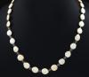 <span class='ref_item'>70 -</span> <span class="object_title">COLLAR DE PERLAS KISHI Y PLATA DORADA</span>  <p><span class="technical_description">Collar compuesto por perlas Kishi doradas combinadas con cuentas de cristal facetado en tono fumé y broche de plata dorada.<br/>Cierre collar: Pestaña<br/>Longitud: 50cm</span><br>Peso: <span class="PESO_HCES1">36,10</span> <span class="PESOUMED_HCES1">gr.</span><br></p>