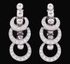 <span class='ref_item'>16 -</span> <span class="object_title">PENDIENTES LARGO EN ORO DE 18KT CON DIAMANTES</span>  <p><span class="technical_description">Pendientes largos realizados en oro de 18 kt formados cada uno por tres argollas de diamantes engastados en grano con un peso total aprox 1ct.<br/>Cierre: Presión<br/>Longitud: 3,5cm</span><br>Peso: <span class="PESO_HCES1">18,20</span> <span class="PESOUMED_HCES1">gr.</span><br></p>