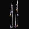 <span class='ref_item'>127 -</span> <span class="object_title">PENDIENTES LARGOS DE ORO DE 18KT Y ZAFIROS DE COLOR</span>  <p><span class="technical_description">Pendientes largos realizados en oro de 18kt, compuestos cada uno por cuatro cadenitas de las que penden zafiros en varios tomos y en talla briolette. Peso total aprox de los zafiros: 6,5 ct.<br/>Cierre: Gancho<br/>Longitud: 8 cm</span><br>Peso: <span class="PESO_HCES1">4,20</span> <span class="PESOUMED_HCES1">gr.</span><br></p>