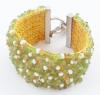 <span class='ref_item'>190 -</span> <span class="object_title">BRAZALETE ANCHO CON PERLAS, CITRINOS Y PERIDOTOS. CIERRE EN PLATA</span>  <p><span class="technical_description">Brazalete compuesto por perlas, citrinos y peridotos con cierre de pestaña realizado en plata.<br/>Longitud: 17cm<br/>Ancho: 4cm</span><br>Peso: <span class="PESO_HCES1">74,40</span> <span class="PESOUMED_HCES1">gr.</span><br></p>