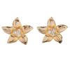 <span class='ref_item'>12 -</span> <span class="object_title">PENDIENTES DE METAL Y PIEDRAS INCOLORAS</span>  <p><span class="technical_description">Pendientes realizados en metal dorado con forma de flor adornados con piedras incoloras<br/>Cierre: Clip</span><br>Peso: <span class="PESO_HCES1">40,70</span> <span class="PESOUMED_HCES1">gr.</span><br></p>