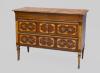 <span class='ref_item'>224 -</span> <span class="object_title">CÓMODA ESTILO LUIS XVI</span>   <p><span class="technical_description">Cómoda en madera de Sapelly con decoración en marquetería de limoncillo en cajones, tabla, laterales y patas. Compuesta por tres cajones, dos centrales y uno superior. Tiradores, boca llaves y remates en bronce dorado. Con llave.</span><br><span class="ALTO_HCES1">83 </span><span class="ALTOUMED_HCES1">cm.</span>x<span class="ANCHO_HCES1">108,50 </span><span class="ANCHOUMED_HCES1">cm.</span>x<span class="GRUESO_HCES1">44,50 </span><span class="GRUESOUMED_HCES1">cm.</span></p>