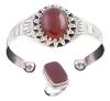 <span class='ref_item'>122 -</span> <span class="object_title">SORTIJA Y PULSERA EN PLATA DE LEY CON CORNALINAS</span>  <p><span class="technical_description">Lote de una sortija y una pulsera en plata de ley. La pulsera es rígida abierta, con un cuarzo cornalina central en talla cabujón oval engastado en bisel. La sortija con otro cuarzo cornalina engastado en bisel<br/>Medida Sortija: 16<br/>Diámetro pulsera: 6,5cm</span><br>Peso: <span class="PESO_HCES1">41,10</span> <span class="PESOUMED_HCES1">gr.</span><br></p>