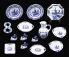 <span class='ref_item'>200 -</span> <span class="object_title">CONJUNTO DE 14 PIEZAS DE CERÁMICA HOLANDESA DE DIVERSAS TIPOLOGÍAS, S.XX.</span>   <p><span class="technical_description">Conjunto de 14 piezas de cerámica holandesa, compuesto por: un plato octogonal, dos platos redondos, un platito cuadrado, dos bandejas ovaladas, dos ceniceros, una jarra, un "8" decorativo y 4 figuras de molino y zueco.</span><br></p>