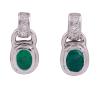 <span class='ref_item'>143 -</span> <span class="object_title">PENDIENTES EN ORO 18 KT, ESMERALDAS Y DIAMANTES</span>  <p><span class="technical_description">Pendientes realizados en oro de 18kt. De dos cuerpos, con movimiento, destacan dos esmeraldas en talla oval engastadas en bisel con un peso total aprox de 1.40ct, con detalle de diamantes, en la parte superior, en talla brillante engastados en grano, con un peso total aprox de 0.12ct.<br/>Cierre: Presión (en oro amarillo y diferentes entre sí)<br/>Medidas: 1,75 x 0,80 cm</span><br>Peso: <span class="PESO_HCES1">6,60</span> <span class="PESOUMED_HCES1">gr.</span><br></p>