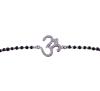 <span class='ref_item'>85 -</span> <span class="object_title">PULSERA EN PLATA DE LEY Y ORO 14KT, DIAMANTES Y CUENTAS DE ÓNIX</span>  <p><span class="technical_description">Pulsera realizada en plata de ley y oro de 14kt. Con cuentas de ónix y símbolo central Om cuajado de diamantes en talla brillante, engastados en grano y en chatón, con un peso total aprox de 0.15ct.<br/>Cierre: Reasa<br/>Longitud: 20 cm</span><br>Peso: <span class="PESO_HCES1">2,60</span> <span class="PESOUMED_HCES1">gr.</span><br></p>