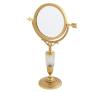 <span class='ref_item'>265 -</span> <span class="object_title">ESPEJO DE TOCADOR O SOBREMESA. ESTILO IMPERIO, FF. S.XVIII</span>  <p><span class="technical_description">Espejo chapado en oro y con cristal de roca tallado en cuerpo. Decoración en relieve de motivos florales y geométricos. Dos caras de distintos aumentos con movimiento de 360º a través de la fecha que permite mover y asegurar el movimiento.<br/>Medidas: 34 x 22cm</span><br>Peso: <span class="PESO_HCES1">1054</span> <span class="PESOUMED_HCES1">gr.</span><br></p>