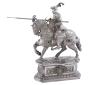 <span class='ref_item'>67 -</span> <span class="object_title">FIGURA DE CABALLERO CON ARMADURA Y LANZA A CABALLO EN PLATA DE LEY Y LA CARA TALLADA</span>  <p><span class="technical_description">Figura de caballero con armadura y lanza montando a caballo, realizada en plata de ley y cara tallada en hueso. Decorada en su totalidad y repujada, está adornada con calcedonias verdes en la pechera lateral, cuarzo cornalina (naranja-marrón) y calcedonias azul añil en la flanquera trasera, y cuarzo azul en la pechera principal, todas ellas en talla cabujón. Con lanza desmontable<br/>Medidas: 31 x 20 x 9,5cm<br/>Peso bruto total: 1989gr</span><br></p>