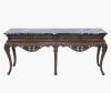<span class='ref_item'>228 -</span> <span class="object_title">CONSOLA ESTILO LUIS XV, S.XX</span>   <p><span class="technical_description">Cuerpo realizado en madera de caoba ricamente decorado con elementos vegetales. Con cuatro cajones y sus llaves. Superficie en mármol negro veteado.</span><br><span class="ALTO_HCES1">81 </span><span class="ALTOUMED_HCES1">cm.</span>x<span class="ANCHO_HCES1">187 </span><span class="ANCHOUMED_HCES1">cm.</span>x<span class="GRUESO_HCES1">50 </span><span class="GRUESOUMED_HCES1">cm.</span></p>