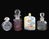 <span class='ref_item'>185 -</span> <span class="object_title">TRES PERFUMEROS EN CRISTAL TALLADO Y UNO EN PORCELANA, PP. S.XX</span>   <p><span class="technical_description">Tres realizados en cristal tallado en tapón y cuerpo, de ellos uno con decoraciones vegetales y otro teñido en tonos rosas. El cuarto realizado en porcelana decorada con elementos florales de colores y firma en la base. <br/>Medidas: 7cm el pequeño, 10cm el mediano, 12,5cm el grande y 8,5cm el de porcelana</span><br></p>